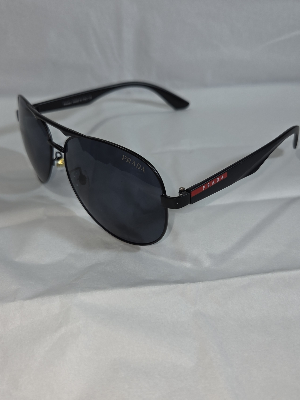 Prada Black Aviator Sunglasses with Red Accent